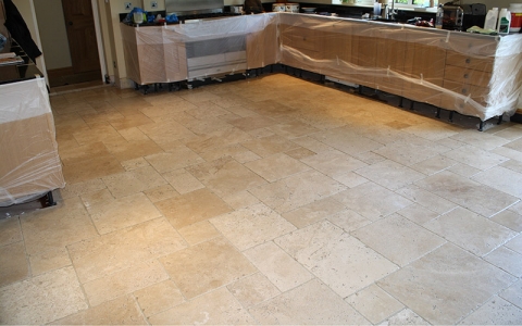 A beautiful travertine limestone kitchen floor after a maintenance clean and re-seal